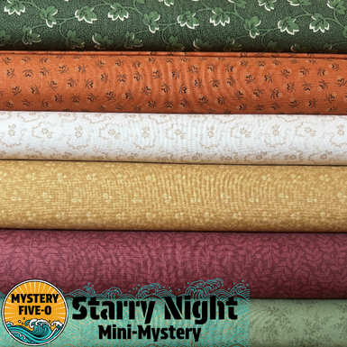 Stack of fabric bolts with 'Starry Night Mini-Mystery' label