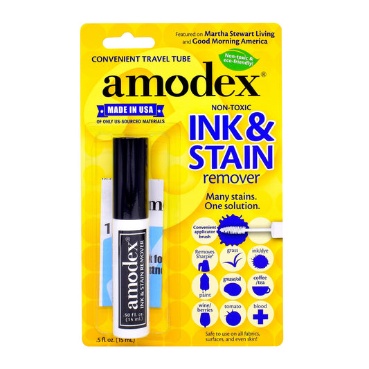 Amodex ink and stain remover packaging with a yellow background