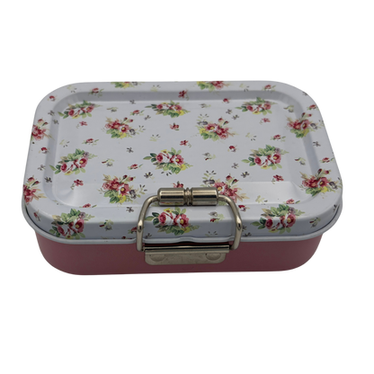 Rectangular tin box with floral pattern on a white background