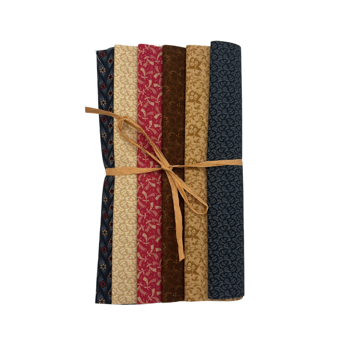 A bundle of six patterned quilting fabrics tied together with a tan string, displayed vertically against a plain white background.