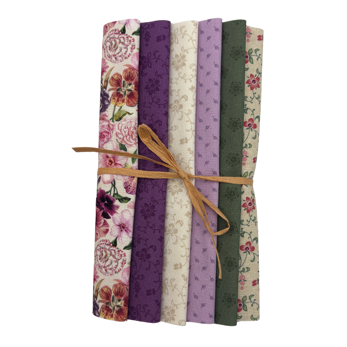 A bundle of six folded fabric pieces tied with a tan string, showing floral and patterned designs in pink, purple, cream, and olive green on a white background.