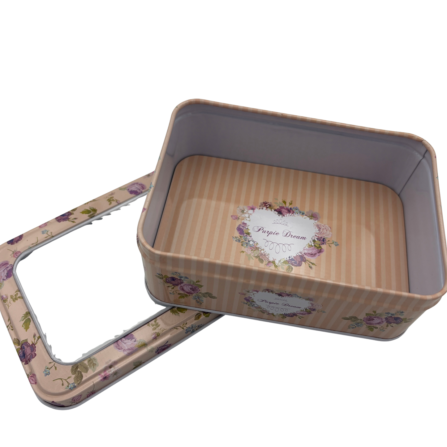 Floral-patterned metal tin with lid on a white background