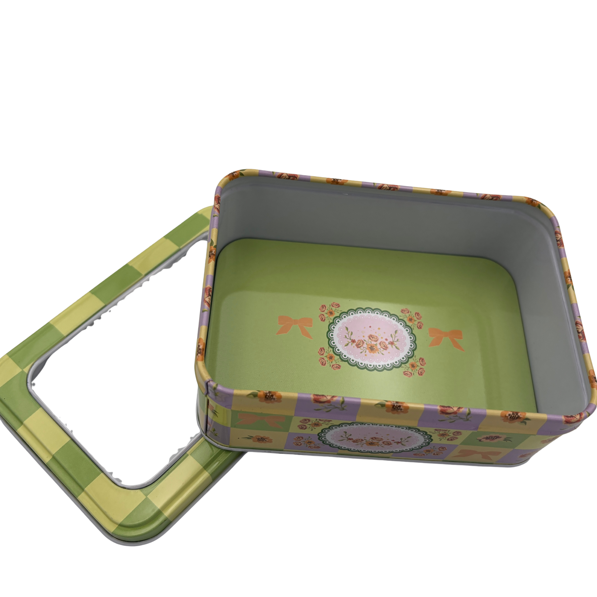 Floral-patterned metal tin with lid on a white background