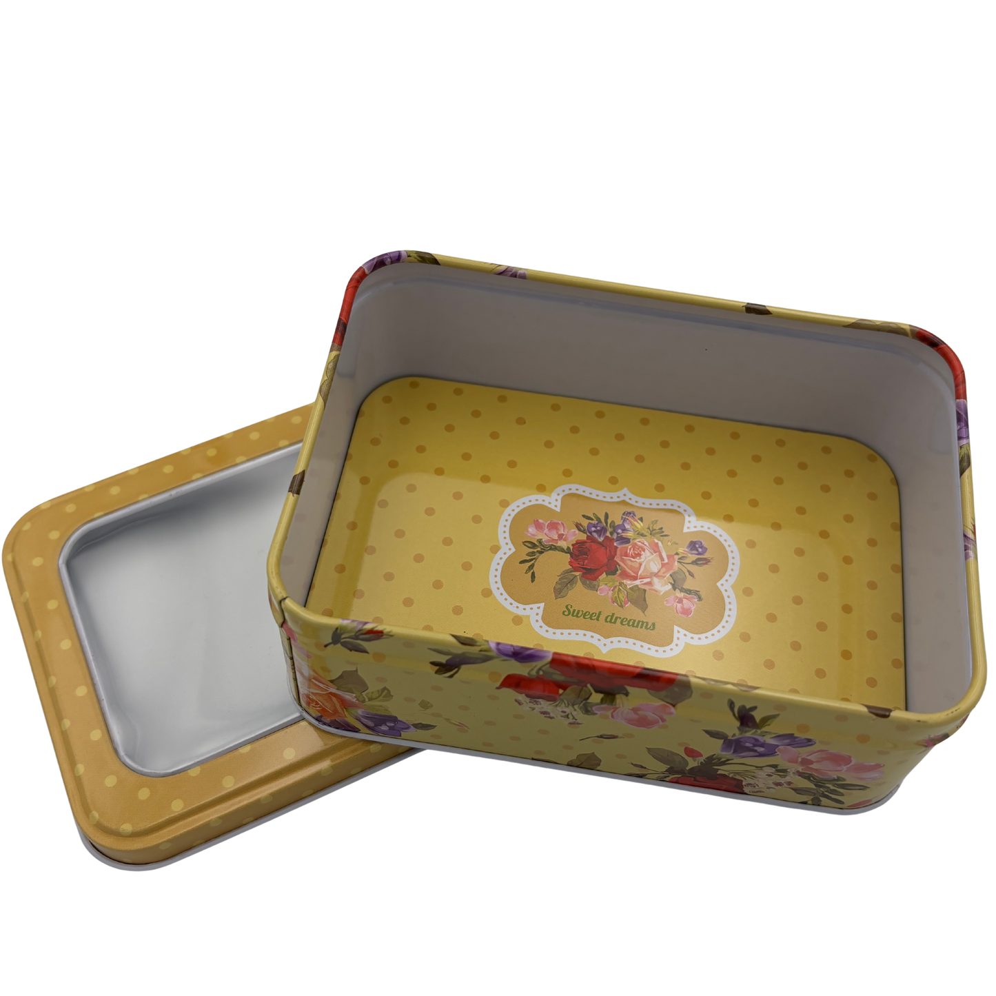 Floral-patterned metal tin with lid on a white background