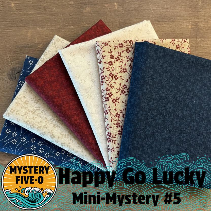 Collection of fabric swatches with patterns on a wooden surface, featuring the 'Mystery Five-O' brand.