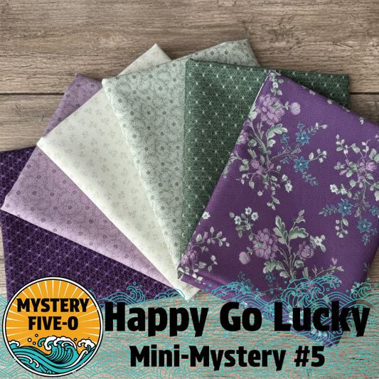Collection of fabric swatches with floral patterns on a wooden surface, featuring the 'Mystery Five-O' logo.