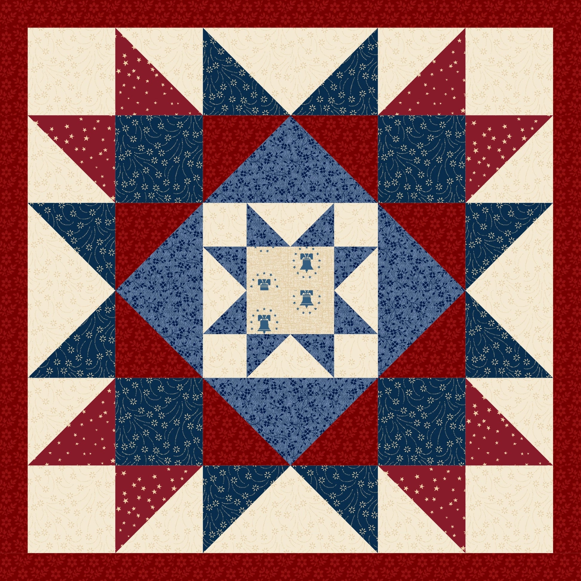 Quilt with star pattern in red, white, and blue on a white background