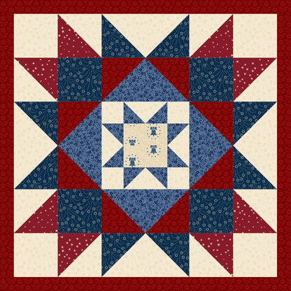 Quilt with star pattern in red, white, and blue on a white background