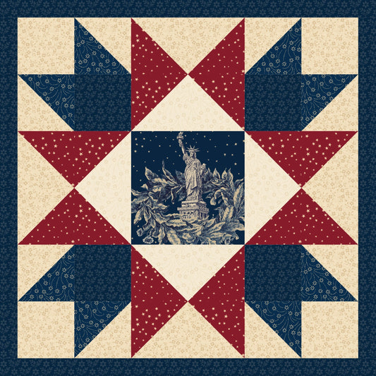 Quilt with red, white, and blue pattern featuring the Statue of Liberty.