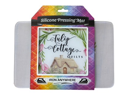 Silicone pressing mat with colorful packaging featuring 'Tulip Cottage Quilts' branding.