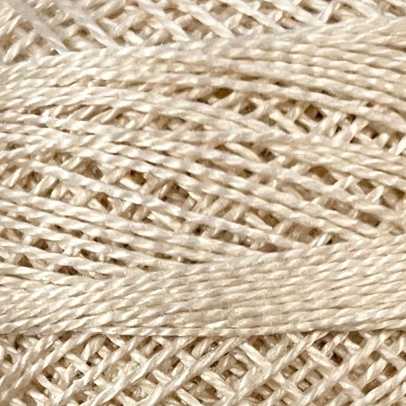 Close-up of beige thread with a textured pattern