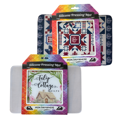 Silicone pressing mats with colorful packaging featuring quilt designs and 'Tulip Cottage Quilts' branding.