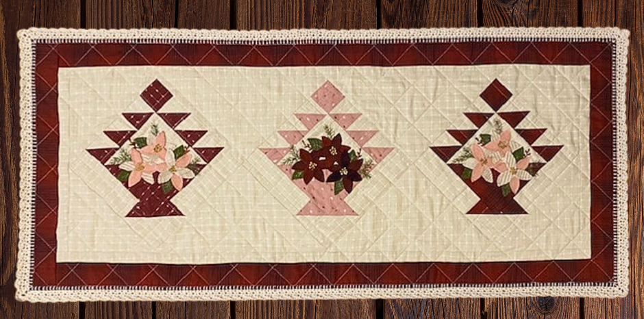Quilted table runner with baskets and wool appliqued poinsettias 