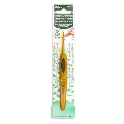 Clover crochet hook with packaging on a white background