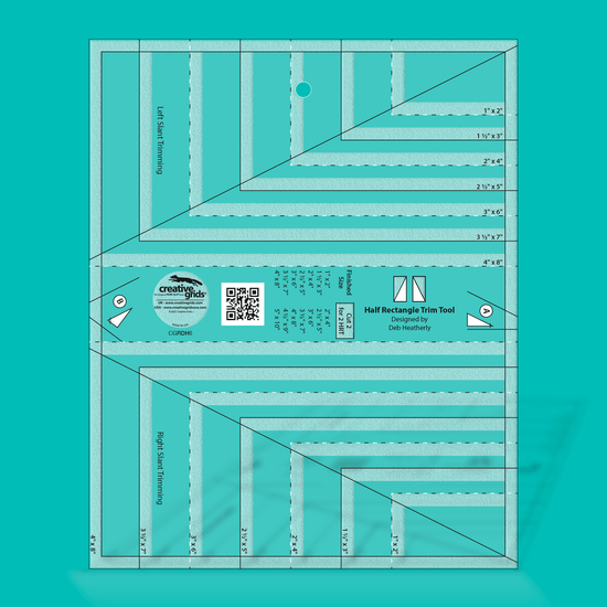 Quilting ruler set on a teal background